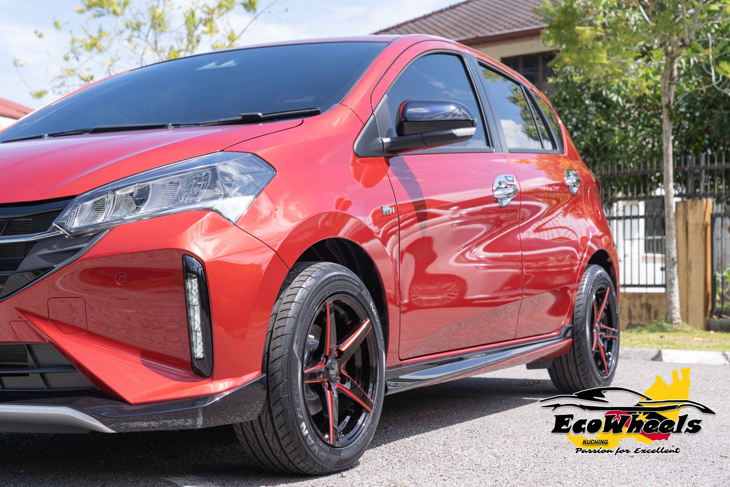 Red Myvi with Lenso Jager Saber